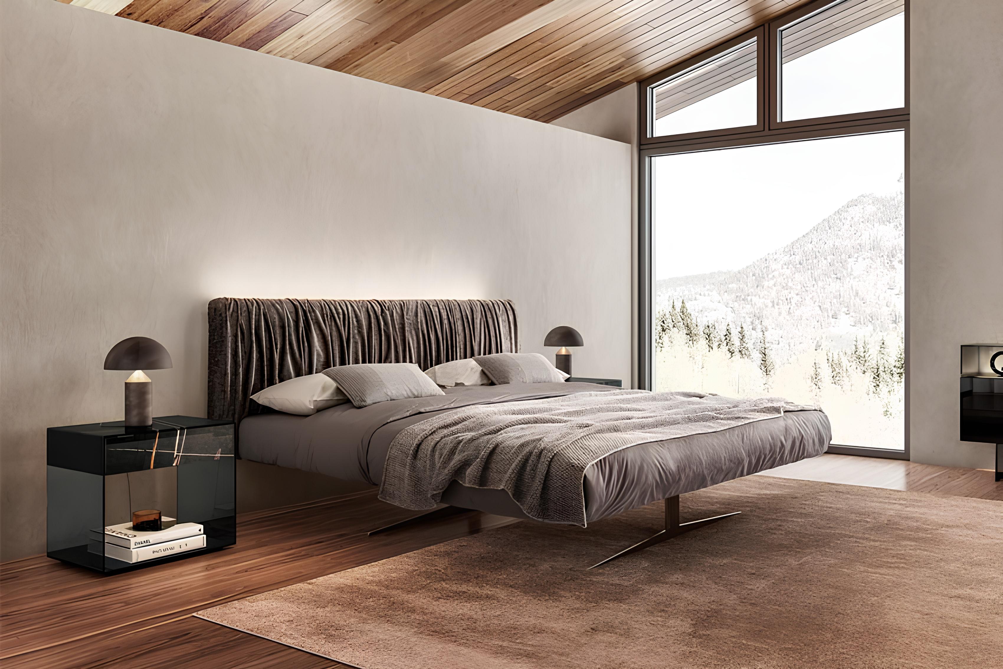 Luxury minimalist bedroom with a modern floating bed, soft gray bedding, and panoramic mountain view through floor-to-ceiling windows. Premium sleep amenities concept for Audemu, ideal for B2B hospitality, luxury Airbnb, and wellness partnerships.