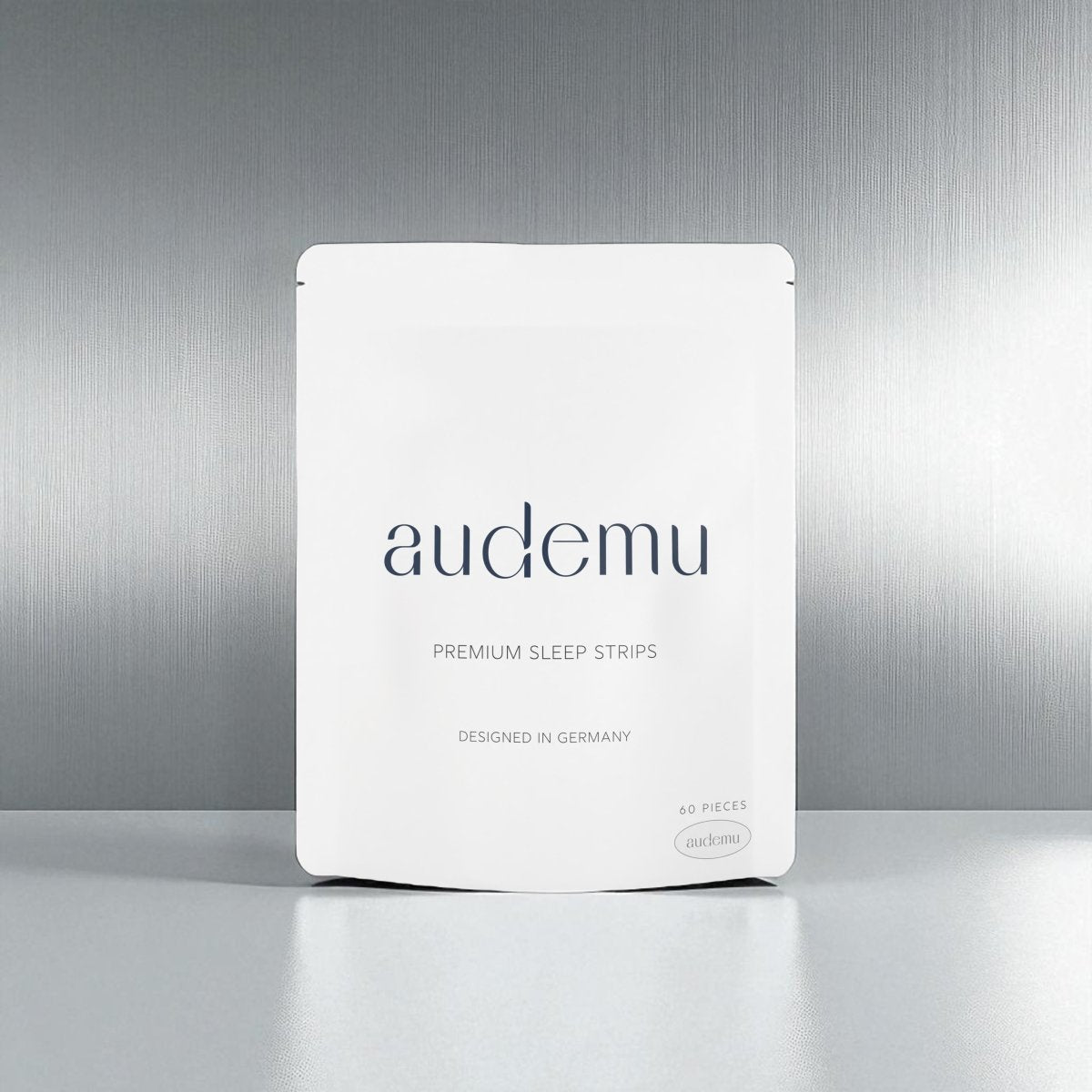 Audemu THE SLEEP STRIP – minimalistisches Verpackungsdesign, Premium SleepCare Produkt für tieferen Schlaf, weniger Mundtrockenheit und bessere Erholung.