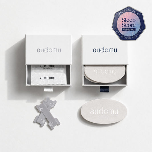 Audemu premium sleep optimization products in minimalist white packaging with soft natural lighting, featuring nasal strips and sleep strips on a clean luxury background and with sleep score validated in scientific research badge.