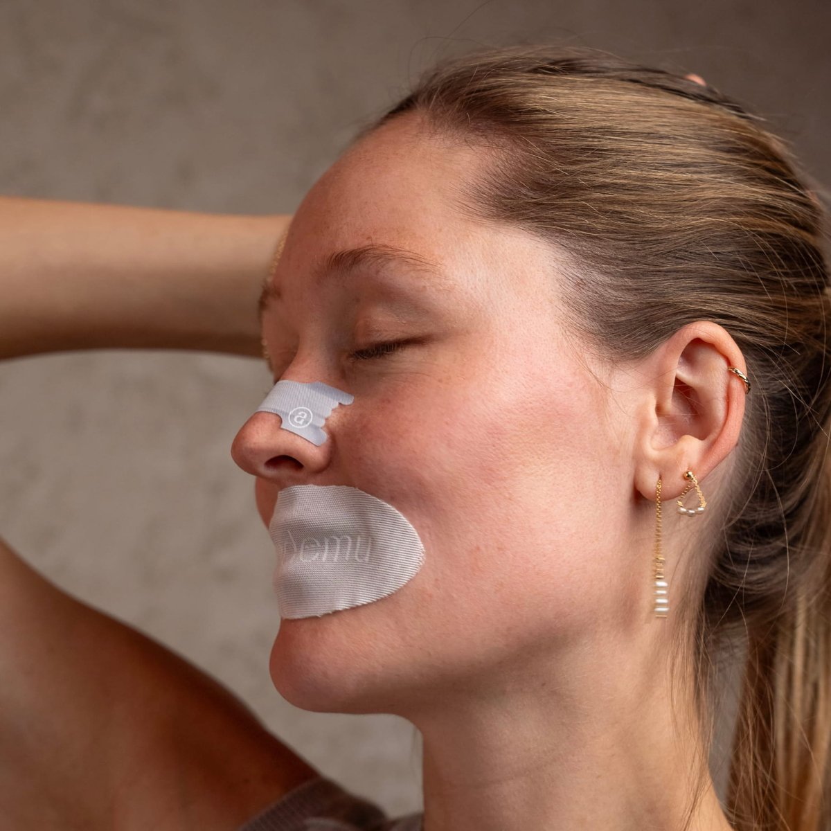 blonde-german-woman-wearing-audemu-nasal-strip-aesthetic-on-nose