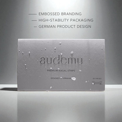 udemu THE NASAL STRIP – Premium Nasenpflaster mit starker Haftung und hypoallergenem Kleber, minimalistische Verpackung im Luxusdesign.
